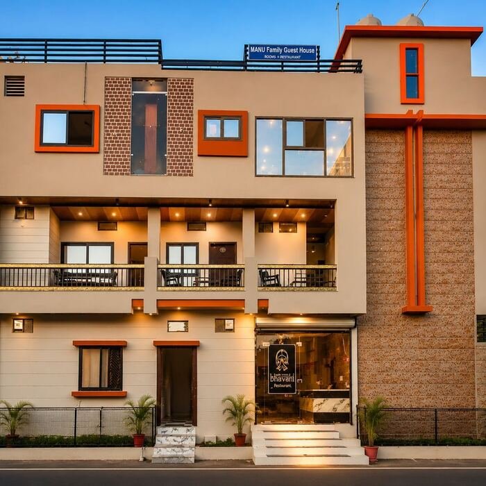 Manu Family Guest House exterior facade in evening light